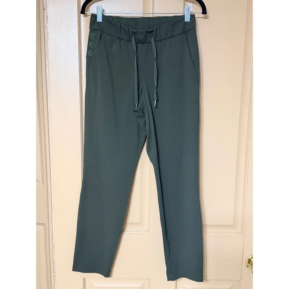Lululemon On The Fly 7/8 Pant Luxtreme Dark Olive Green Drawstring Trousers